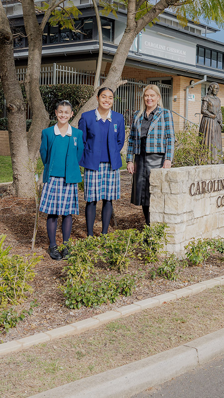 Caroline Chisholm Catholic College Glenmore Park students with dedicated principal Tiana Cairns