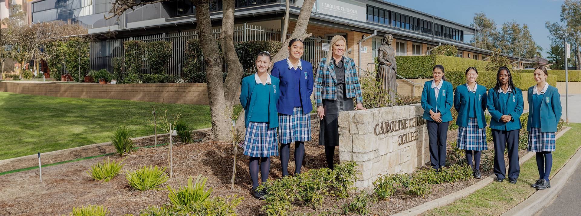 Caroline Chisholm Catholic College Glenmore Park students with dedicated principal Tiana Cairns