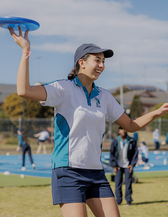 Caroline Chisholm Catholic College Glenmore Park student holding a frisbee