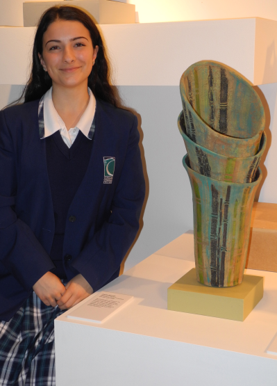 Claudia Beghetto and her ceramic creation on display in Notanda.
