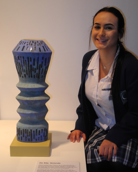 Nicoletta Bellino and her ceramic art creation.