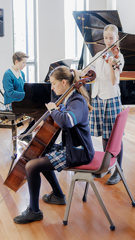 Caroline Chisholm Catholic College Glenmore Park students playing frisbee