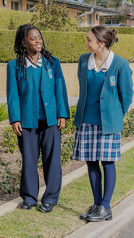 Caroline Chisholm Catholic College Glenmore Park students standing on campus