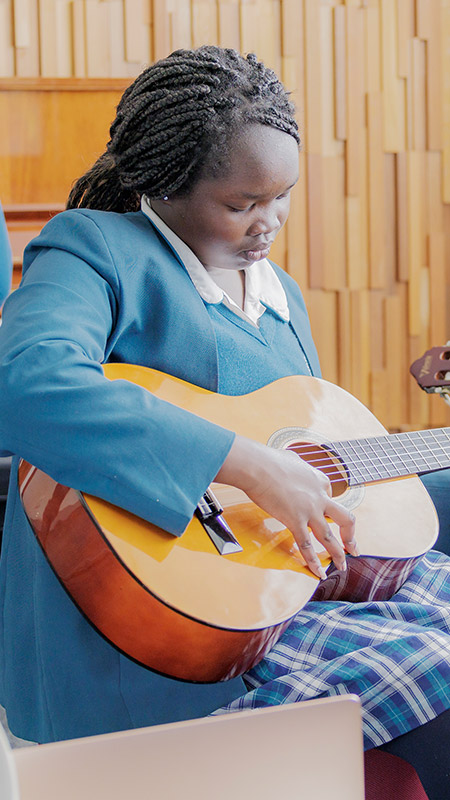 Group music lessons at Caroline Chisholm Catholic College Glenmore Park