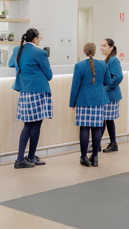 Caroline Chisholm Catholic College Glenmore Park students waiting for coffee in school canteen