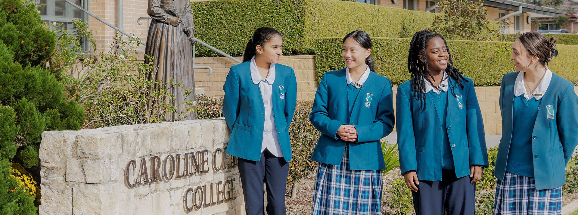 Caroline Chisholm Catholic College Glenmore Park students standing on campus
