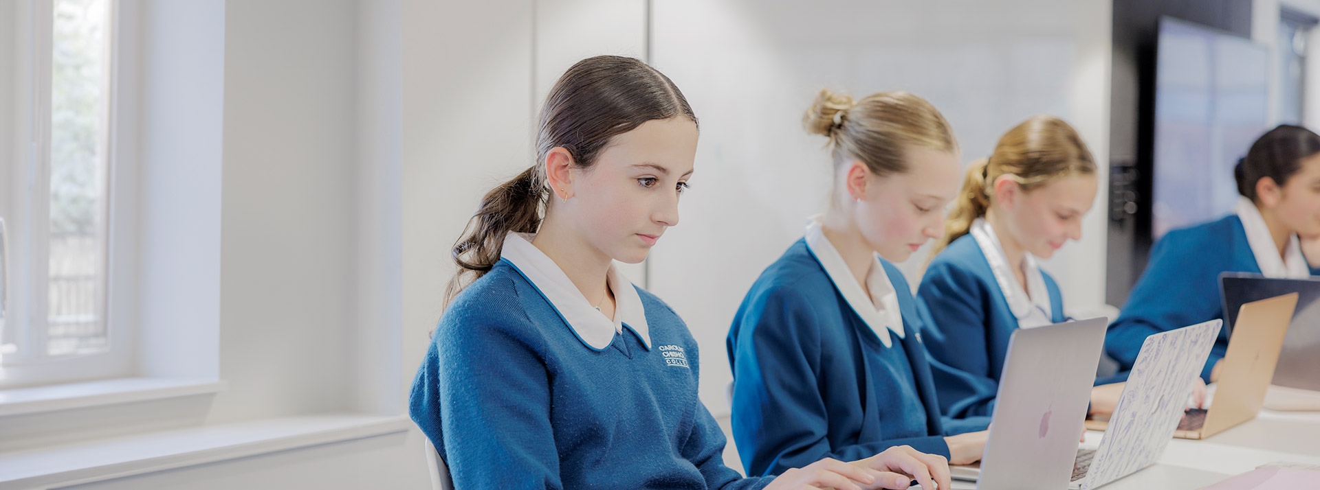Caroline Chisholm Catholic College Glenmore Park students on laptops