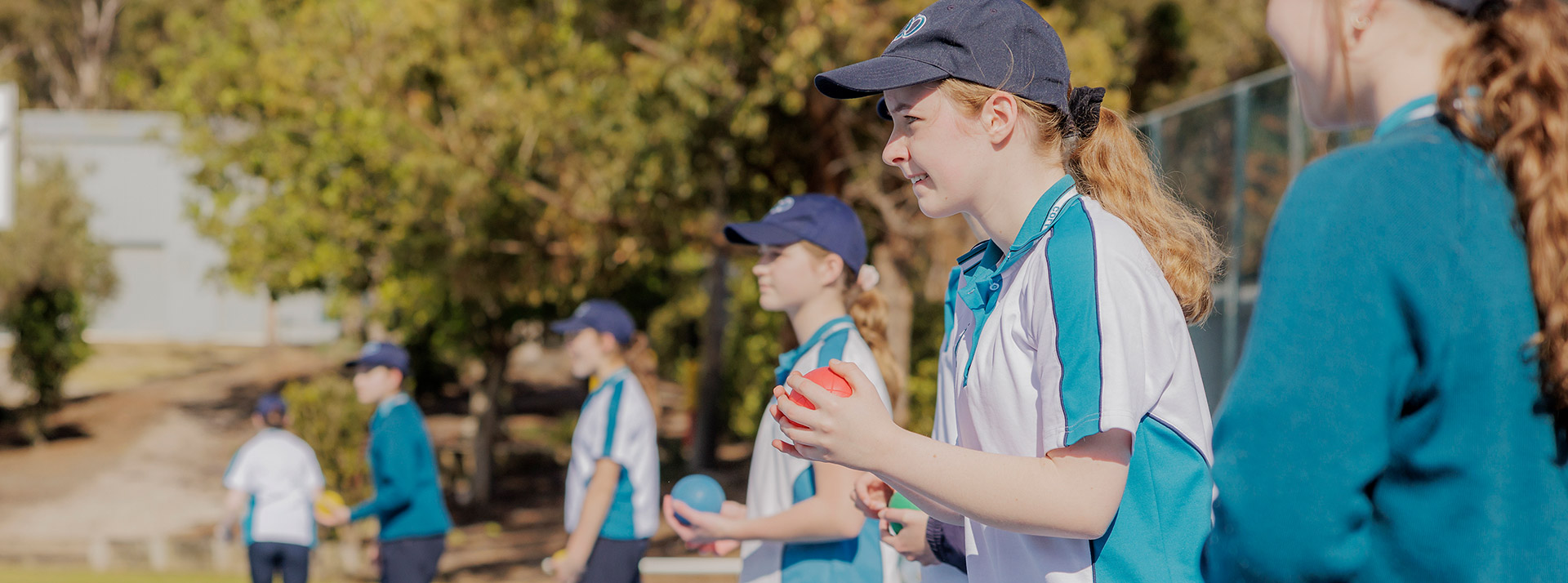 Caroline Chisholm Catholic College Glenmore Park students playing sports
