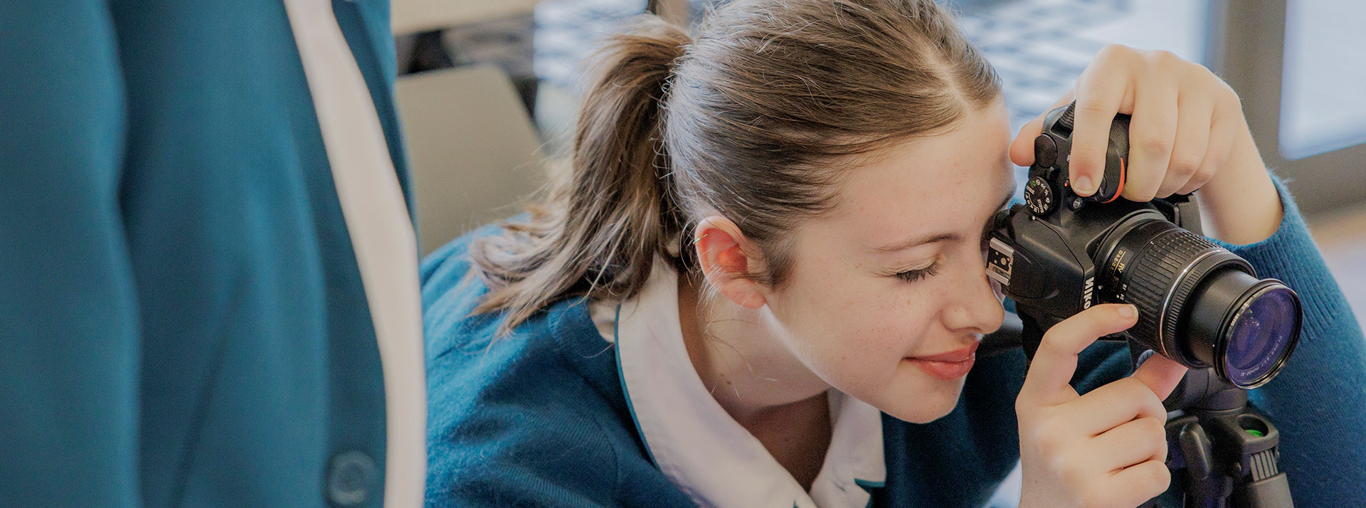 Caroline Chisholm Catholic College Glenmore Park student using camera