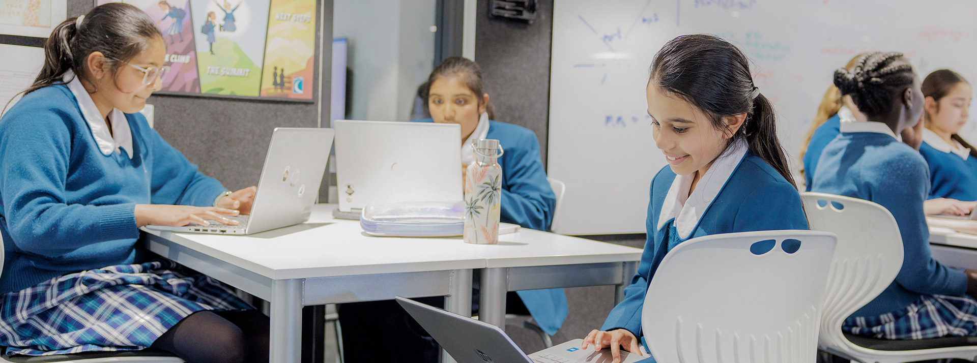 Caroline Chisholm Catholic College Glenmore Park students using learning devices