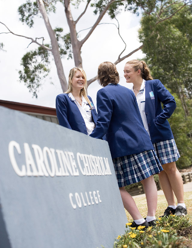 Caroline Chisholm Catholic College Glenmore Park students standing on campus