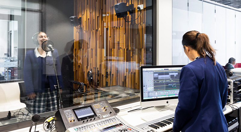 Caroline Chisholm Catholic College Glenmore Park students inside recording studio