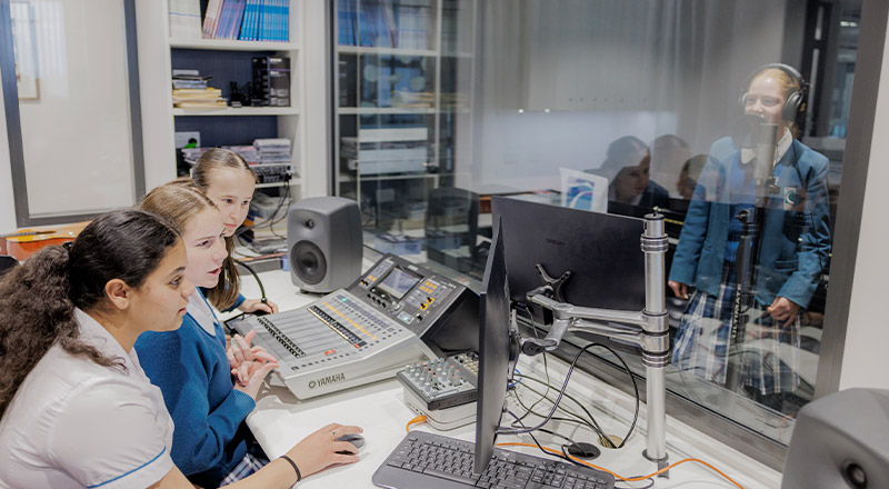 Caroline Chisholm Catholic College Glenmore Park students inside recording studio